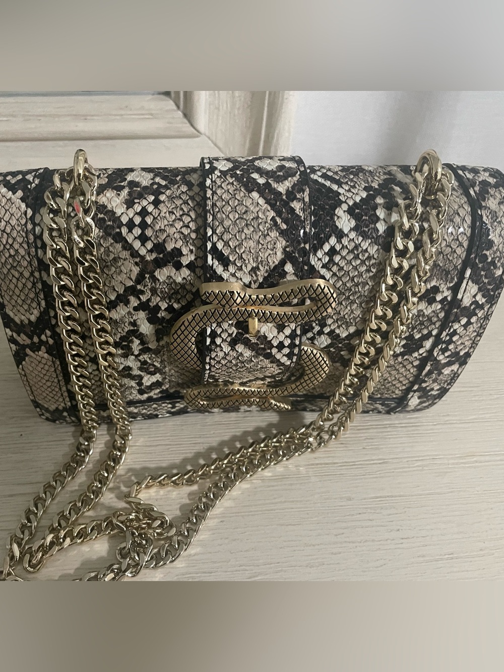 Express women Black & Cream Snake-Print Crossbody with Gold Chain